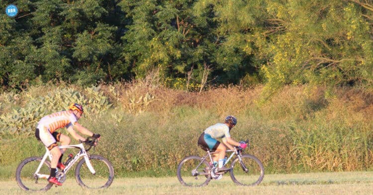 man and woman cycling different frames