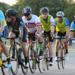 group of cyclists riding