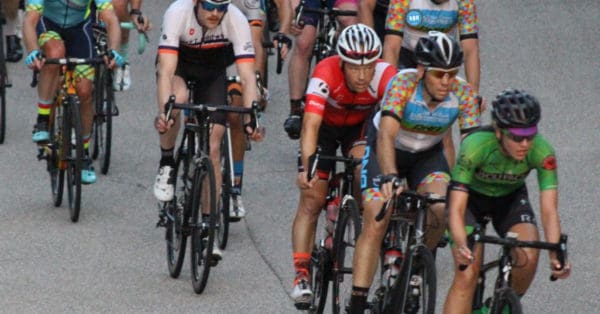 group of cyclists riding