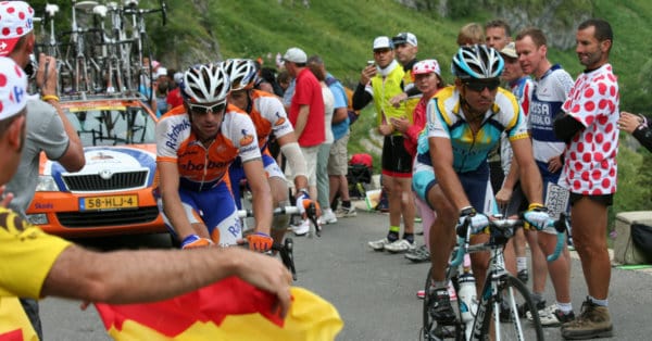 cyclists climbing at altitude