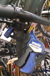 Use a Carpenter’s Clamp to Hold Brakes When Adjusting
