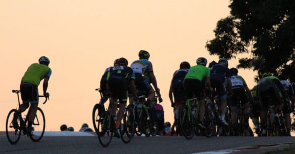 cyclists at dusk