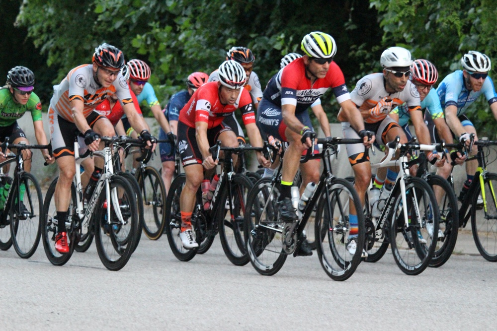 group of cyclists riding