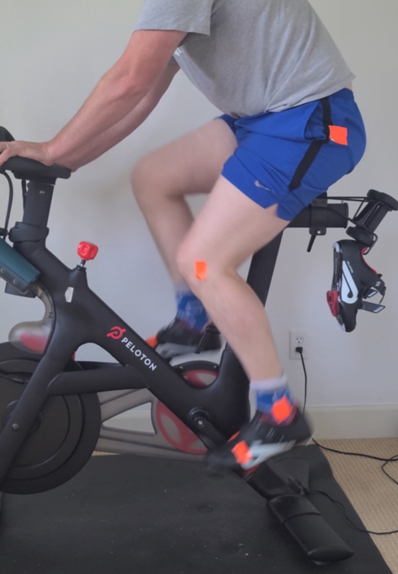 remote fitting of a Peloton to resolve knee pain from indoor cycling training