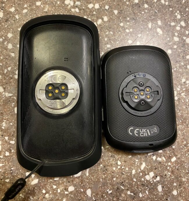 Back of Garmin 1040 solar and 540 solar bike computers