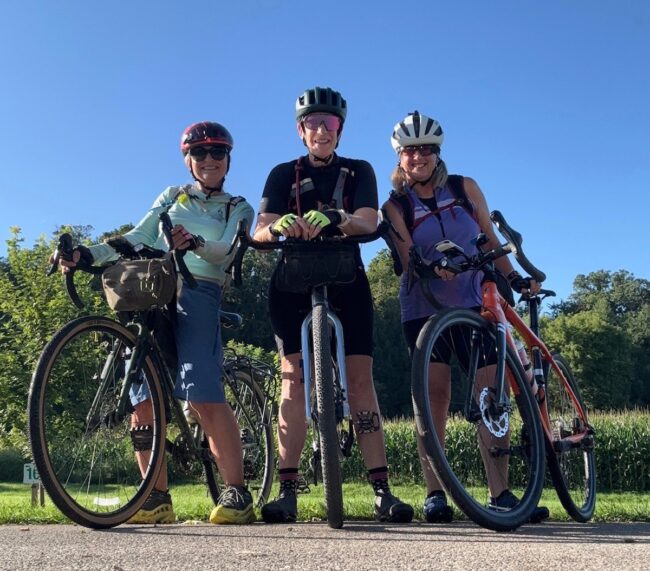 group photo of cyclists on cycling adventure