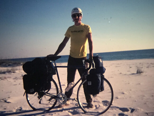bike trip in Florida with cyclist in sand