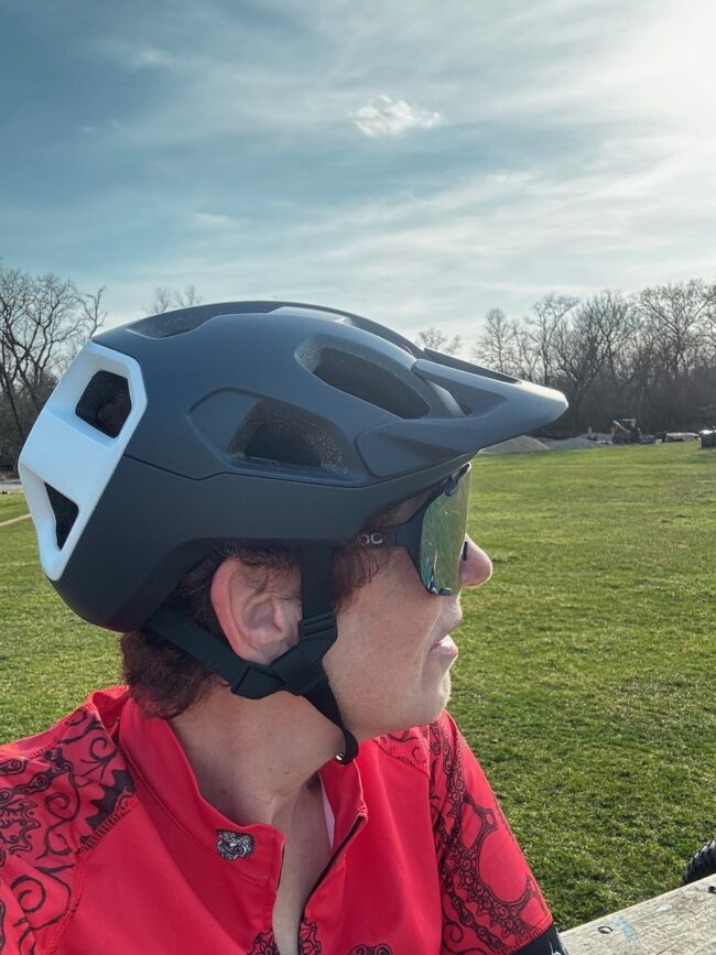 POC helmet on cyclist side view