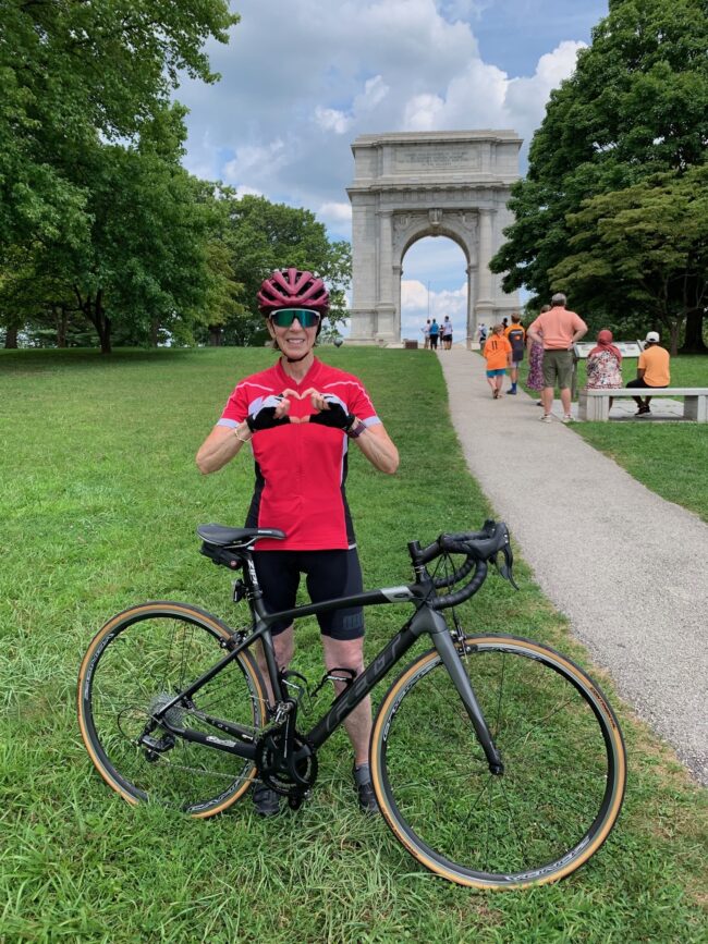 Jo smiling with her rebuilt 47cm Felt ZW road bike on a ride in Valley Forge